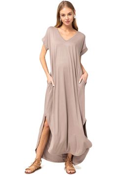 Our everyday maxi dress is so soft, comfortable & light weight you will want to wear it everyday. It features a V-neckline, short rolled sleeves, sides seam pockets, a high low scoop hemline, side slits, shirring on the back and an a-line maxi silhouette. Dress it up with a kimono or dress it down with a front knot and some casual jewelry. Small Bust 38" Length 51" : Medium Bust 40" Length 51" Large Bust 42" Length 51" : XL Bust 48" Length 55" 1X Bust 50" Length 55" : 2X Bust 52" Length 55" Pocket Maxi Dress, Silhouette Dress, Raglan Sleeve Top, Nude Wedges, Sheer Knit, Knit Maxi Dress, Casual Jewelry, Floral Embroidered Dress, Maxi Knit Dress