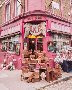 a store front with baskets stacked on the outside