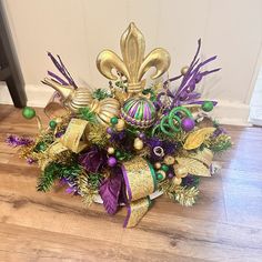 an arrangement of christmas decorations on the floor