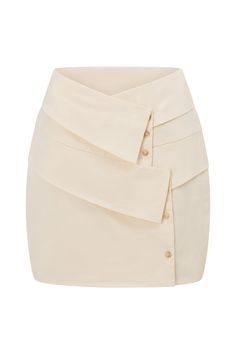 Structured to perfection! The Leo Skirt is made from a high quality structured cotton fabric in cream. It is a high waisted style featuring asymmetric folded panels and button details. Complete the look with the Leo Top and boots! Designed exclusively by Sabo. Cream Skirt, High Waist Fashion, Sabo Skirt, Elegant Dresses For Women, Elegant Dresses, Cotton Fabric, High Waisted, Womens Dresses, Skirt