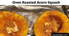 an open roasted acorn squash on tin foil with the words oven roasted acorn squash