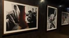 three black and white pictures hanging on the wall