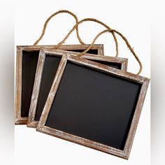 three old wooden frames tied with twine