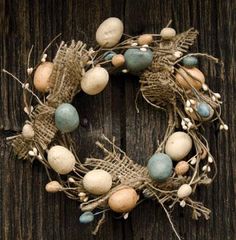 an easter wreath made out of burlocks and eggs