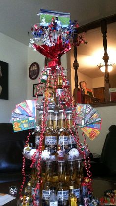 a christmas tree made out of beer bottles