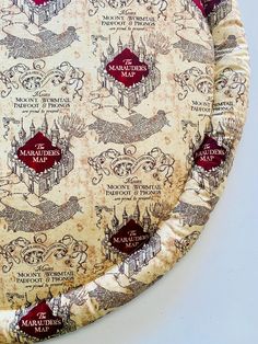 a harry potter themed paper plate with hogwart's map on it