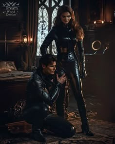 a man and woman dressed in black leathers posing for a magazine advertise