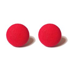 two red buttons sitting on top of each other