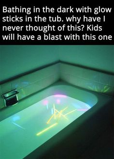 a bathtub that has been lit up with colored lights in the dark and glow sticks in the tub, why have i never thought of this? kids will have a blast with this one