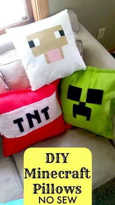 three minecraft pillows sitting on top of a couch with the words diy minecraft pillows no sew