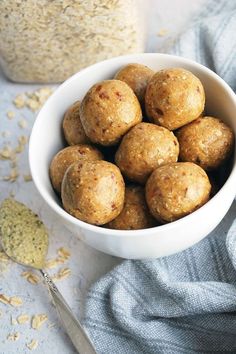 a white bowl filled with oatmeal energy bites