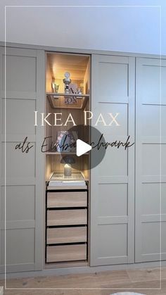 a walk in closet with shelves and drawers