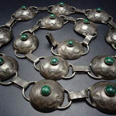 VINTAGE STERLING SILVER CONCHO BELT DESCRIPTION:  This versatile belt features round domed hand-stamped sterling silver concho links, each one adorned with round cabochons of natural green turquoise. This belt will be a cherished addition to your collection of fine vintage Southwestern and Native American jewelry. MEASUREMENTS:  Belt measures 29" long Conchos measure 1 1/2" x 1 1/8" WEIGHT:  135.5 grams SIGNED:  no STERLING:  unmarked, verified sterling silver Jewelry Measurements, Link Belt, Concho Belt, Suspender Belt, American Jewelry, Green Turquoise, Native American Jewelry, Turquoise Jewelry, Sterling Silber