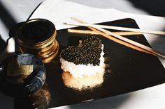 a heart shaped sushi on top of a table