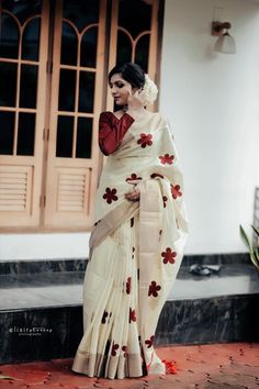 Fabric :   Tissue with Appliq design Color :      Maroon Kasavu :   Light Kasavu Pallu :       5 inch Kasavu Border :    4 inch Kasavu Tussles(Kunchalam) : yes Blouse :    With approx. 1 mtr Unstitched Blouse and one meter extra contrast blouse Saree length : 6.25 meter with blouse This is a special weave from the talented weavers of Kuthampully  Gentle cold water hand wash only. Dry clean recommended.   Do not soak in detergent for a longer duration. Elegant Tissue Silk Saree With Motifs, Diwali Off-white Chanderi Saree, Chanderi Saree In Off White For Diwali, Off White Chanderi Saree For Diwali, Traditional Saree With Motifs In Tissue Silk, Off White Art Silk Saree With Cutdana, Tissue Silk Saree With Resham Embroidery For Puja, White Saree With Dori Work For Puja, White Tissue Silk Blouse With Zari Weaving