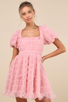 Flirt your way through all the cutest events in the Lulus Utterly Adored Pink Tulle Textured Puff Sleeve Bow Mini Dress! Dreamy tulle boasts a cloud-like textured effect (with contrasting white stitching) as it shapes short puff sleeves with elastic at the cuffs. Square neckline tops a princess-seamed bodice with a single tie at the back and a fitted waist. Skirt has a flaring silhouette that ends at a ruffled mini hem. Darling bow details throughout lend a coquette finish. Hidden zipper/clasp at back. Fit: This garment fits true to size. Length: Mid-thigh. Size medium measures 33" from shoulder to hem. Bust: Great for any cup size. Waist: Fitted - very fitted at natural waist. Hip: Not Fitted - fuller skirt allows room for hips. Undergarments: May be worn with a strapless bra, adhesive br Pink Puffy Sleeve Dress, Tulle Texture, Puffy Sleeve Dress, Bow Mini Dress, Pink Dress Short, Puff Sleeve Mini Dress, Textured Dress, Pink Tulle, Strapless Bra