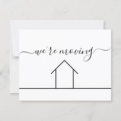 a white card with the words we're moving written on it