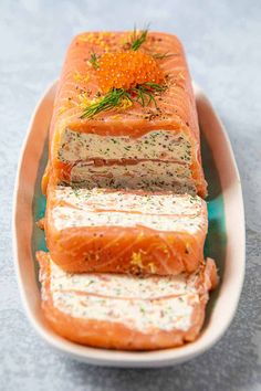 salmon with cream cheese and dill pickles in a dish