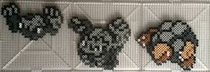 three pieces of art made out of black and white beads with different designs on them