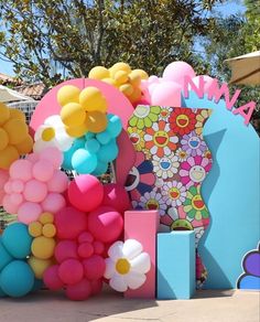 the balloon sculpture is made up of many different colors