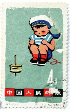 a postage stamp with an image of a child on the front and chinese characters on the back