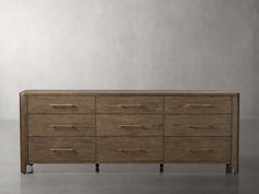 a large wooden dresser sitting on top of a floor