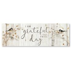 a wooden sign that says i am grateful for this day with birds and flowers on it