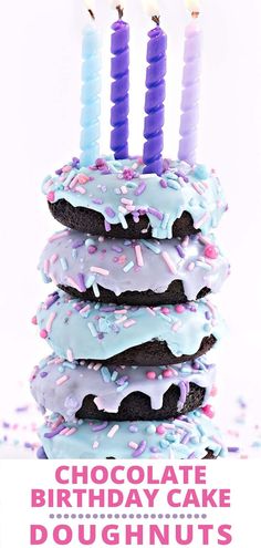 chocolate birthday cake doughnuts with sprinkles and lit candles on top