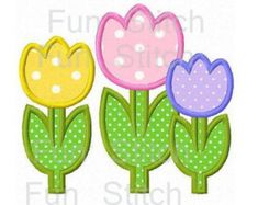 three colorful flowers with polka dots on them