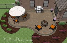 an aerial view of a patio with seating and umbrella