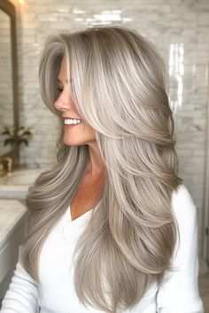 Older Women Long Hair, Silver Hair Color Ideas, Feathered Hair Cut, Grey Blending, Covering Grey Roots, Long Silver Hair, Feathered Hair, Bombshell Hair, Dark Blonde Hair Color