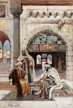 two men are sitting on a rug in front of an archway and another man is standing next to him