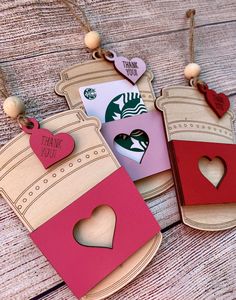 three valentine's day gift tags with hearts and starbucks coffee cups attached to them