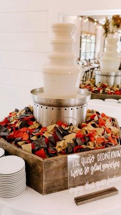 a table topped with plates and a cake