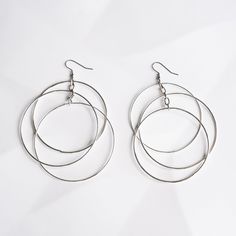 KISS Earrings - Twisted Silver Trendy Dangle Hoop Earrings In Alloy, Alloy Drop Earrings, Alloy Drop Hoop Earrings, Trendy Alloy Jewelry With Matching Earrings, Trendy Alloy Hoop Earrings, Chic Pierced Metal Hoop Earrings, Trendy Alloy Drop Earrings, Nickel-free Alloy Dangle Jewelry, Nickel-free Dangle Jewelry For Parties