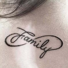 a woman's neck with the word family written in cursive writing on it