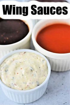 three different sauces in small white bowls with the words wing sauces above them