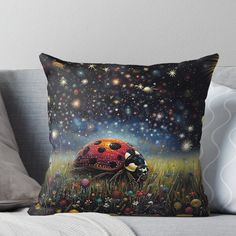 a painting of a ladybug in the grass with stars above it throw pillow