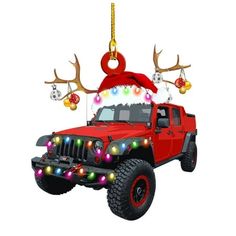 a red jeep decorated with christmas lights and reindeer antlers