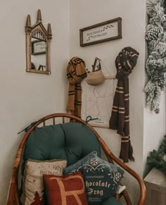 a chair that has some pillows on it in front of a wall with pictures and decorations