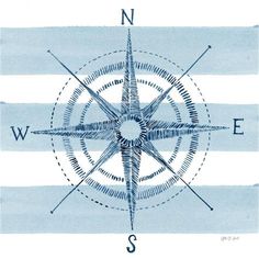 a blue and white compass with the letter s in it's center, surrounded by lines