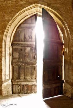 an open door with light coming through it