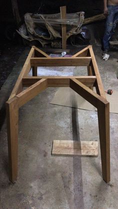 a wooden table being built in a garage