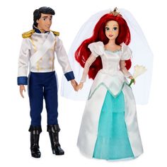 the little mermaid and prince doll are holding hands