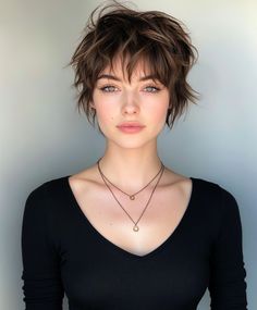 A sleek version of the shaggy layers pixie offers a more polished and refined take on this relaxed style. Pixie Wolf Cut Hair, Pixie Wolf Cut, Dark Pixie Cut, Shaggy Pixie, Brunette Pixie, Shaggy Bob Hairstyles, Platinum Blonde Hair Color, Pixie Cut Styles, Blonde Hair Transformations