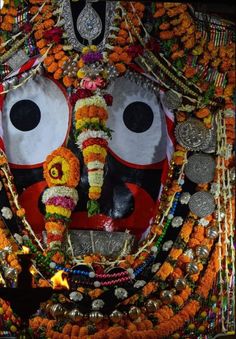 an elaborately decorated mask is shown in this photograph