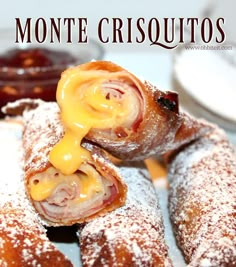 there is a pastry with cheese on it and the words monteriquitos written in spanish