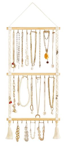 PRICES MAY VARY. cotton, wood Stylish Design: Wall hanging jewelry organizer is designed by using wooden sticks with hooks and cotton rope, filled with boho style,beautiful, pretty,sturdy and durable, suitable for any home decoration. Functional: Necklace display rack comes with 30 hooks to meet your daily use.The hooks are sturdy and durable. And the braided rope pattern on both sides can hair bow holder and hang earrings with fish hooks. Versatile Jewelry Organizer:The jewelry rack has enough Wall Hanging Jewelry Organizer, Necklace Rack, Necklace Hanger, Bow Organizer