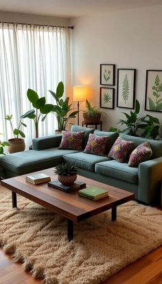 a living room filled with lots of furniture and plants on top of a wooden table