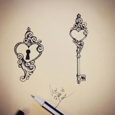 a drawing of two keys and a keyhole in the shape of a heart